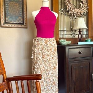 Pink bodysuit. Very little use!!